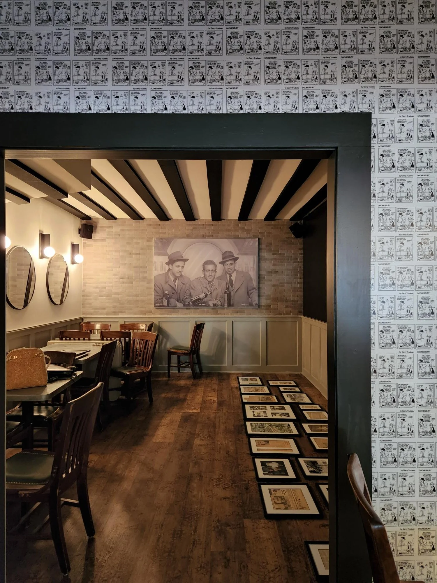 Doonsbury wallcovering on back wall, Gary Trudeau was frequent patron