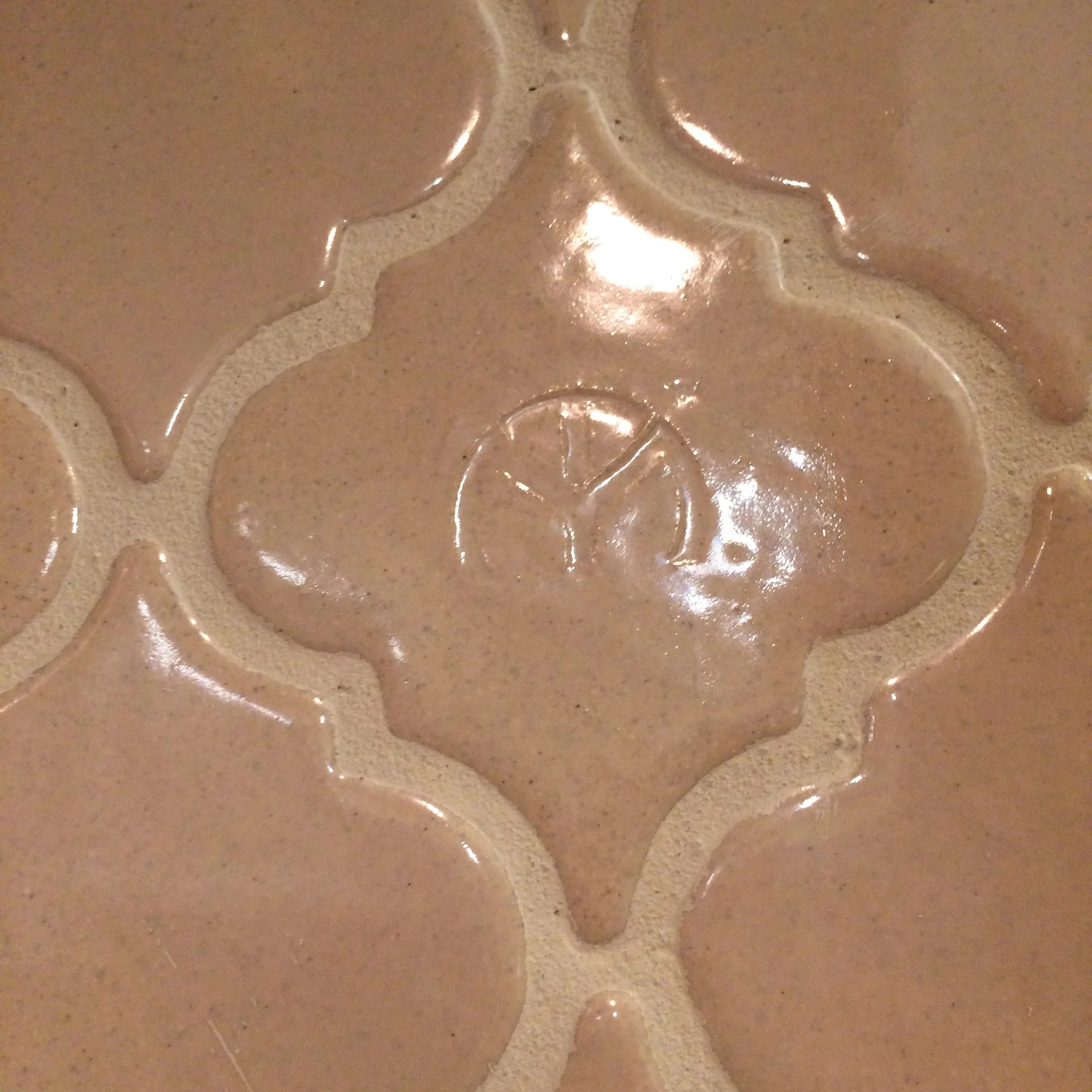 Customers receive a logo tile to install, if desired