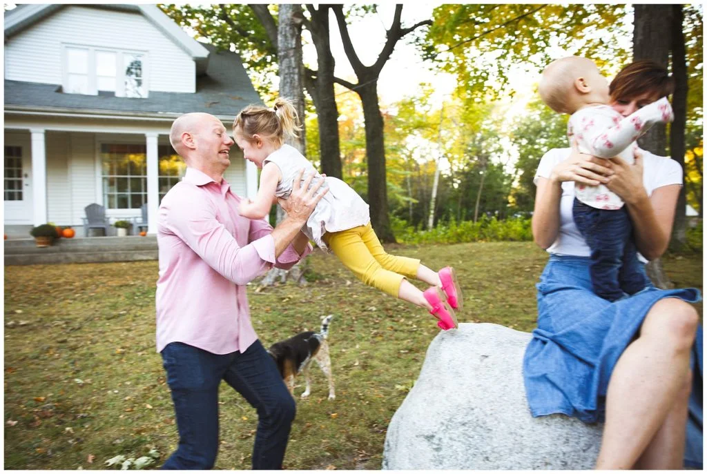 Fall family bonding at home, Fox Point WI, there goes super girl!