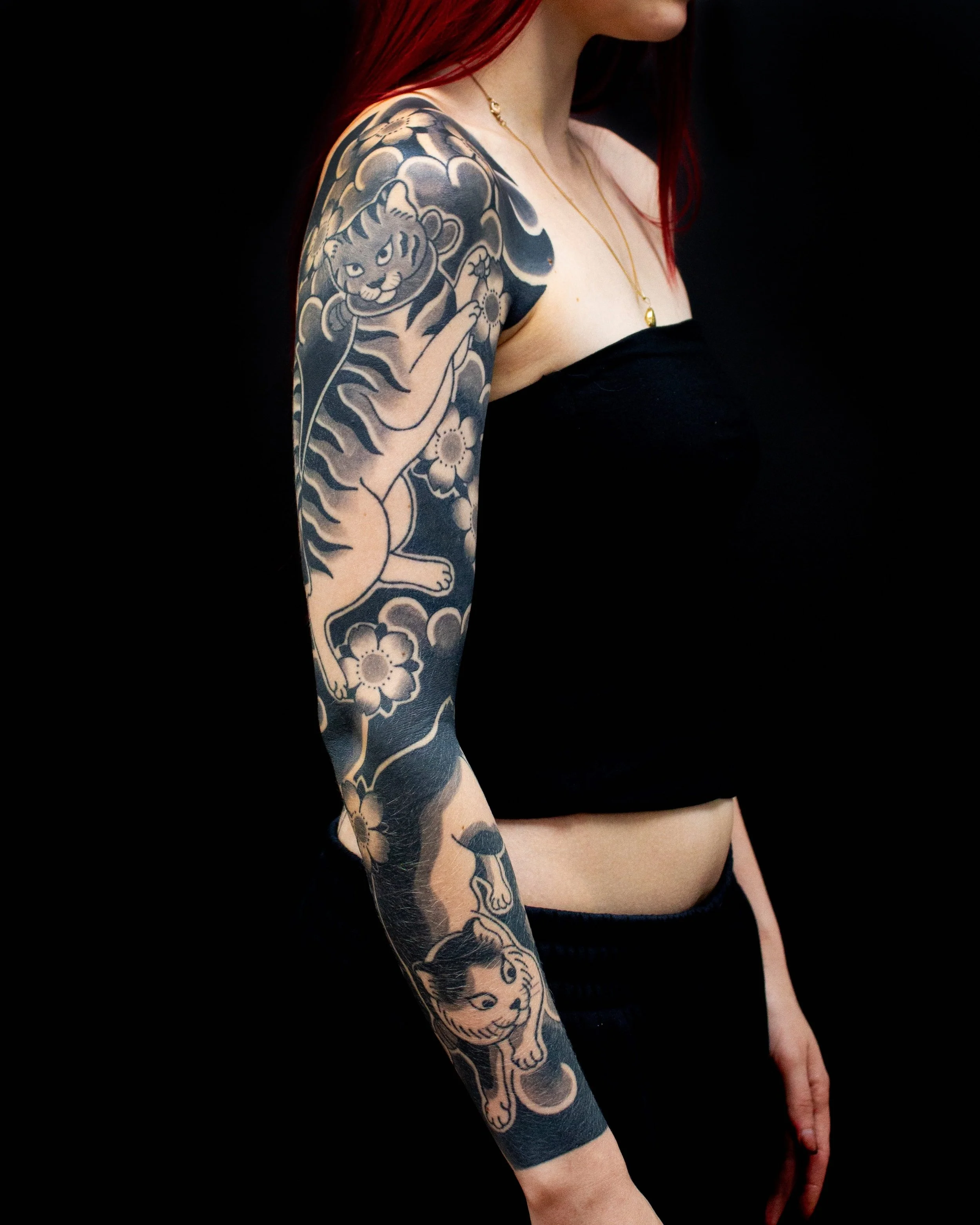 Thinking about getting a Japanese Cat tattoo? Meaning, Symbolism &amp; Sleeve design