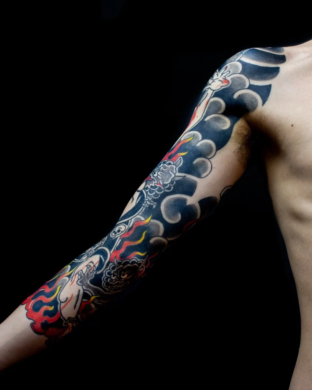 Japanese Irezumi sleeve featuring oni demons, skulls and flames representing hell, inspired by The Spider’s Thread by Akutagawa Ryunosuke.