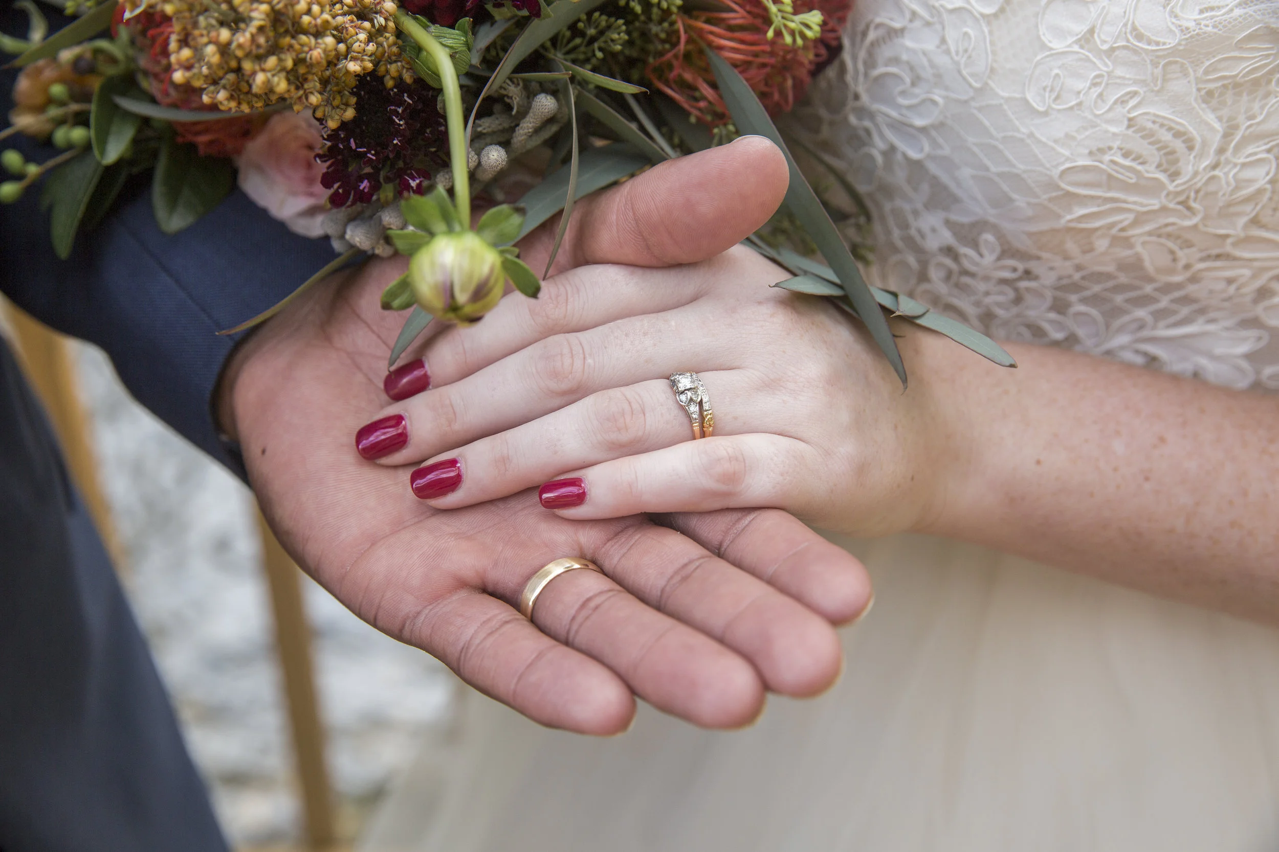 bride and groom hands.jpg