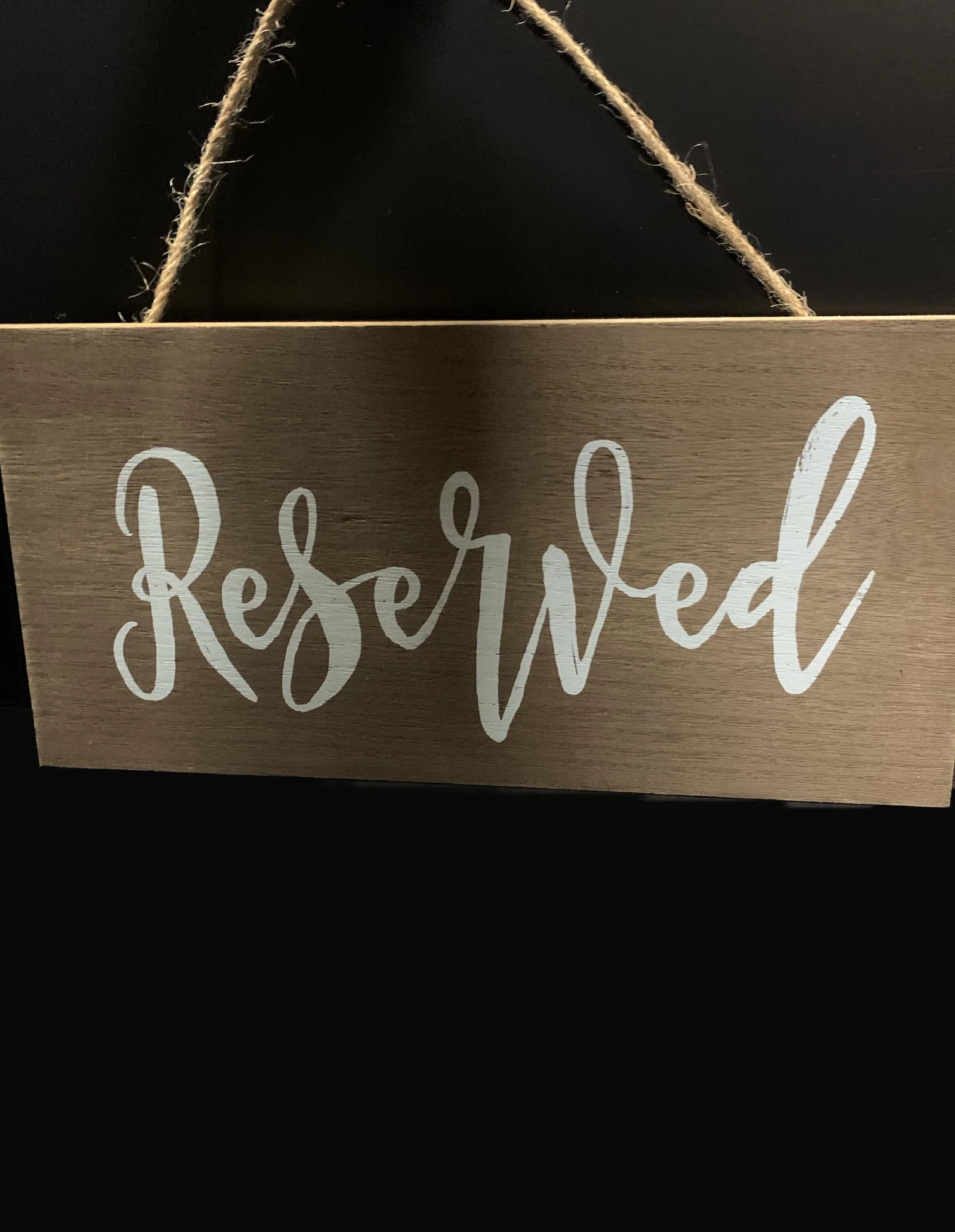 wooden reserved sign Q8.JPG