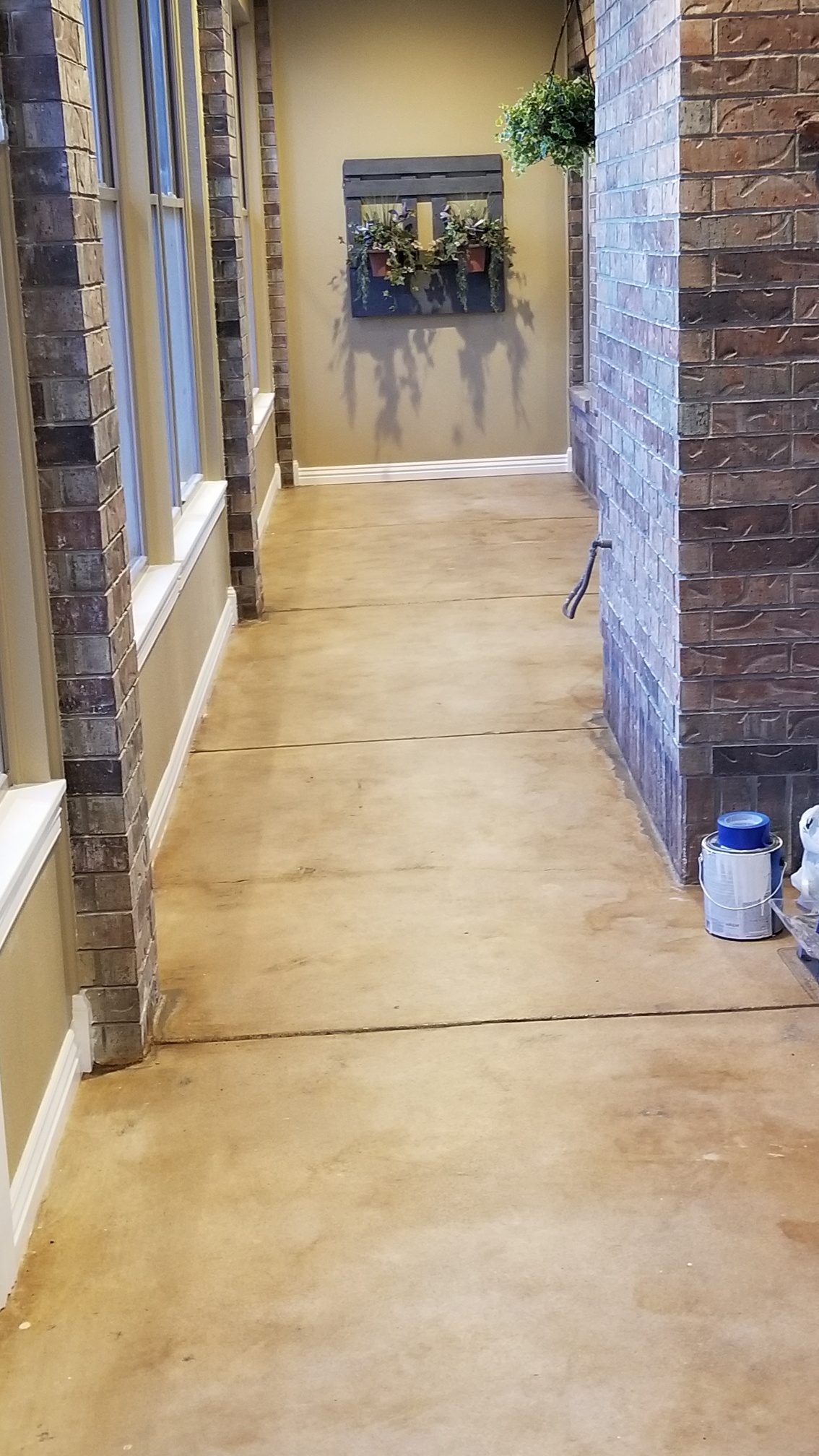 Finish Work of Inside Constructed Sunroom- Stained Concrete Floor