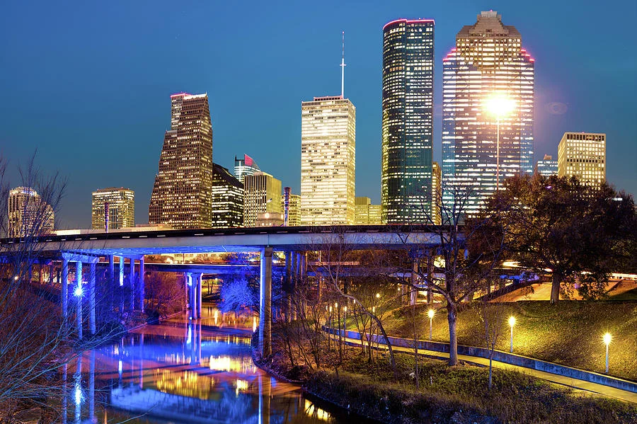 downtown-houston-city-skyline-at-night-on-the-buffalo-bayou-gregory-ballos.jpg