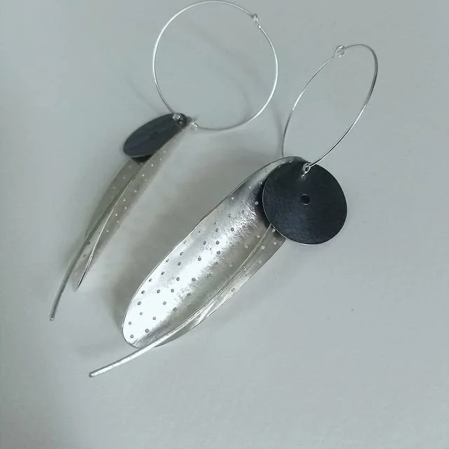 DROP EARRINGS : Sterling silver pod and oxidised disc,hoop earrings.