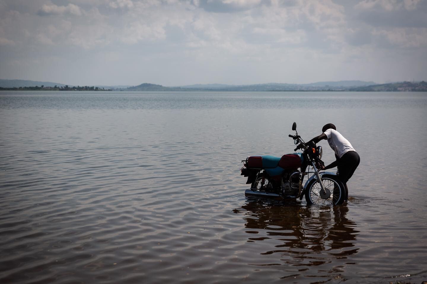 Motorbikes are a very common form of transportation in Uganda and they also serve as taxis, covering areas that vans don&rsquo;t. There are many unpaved roads that generate a lot of dust and dirt. As such, you regularly see the drivers washing their 