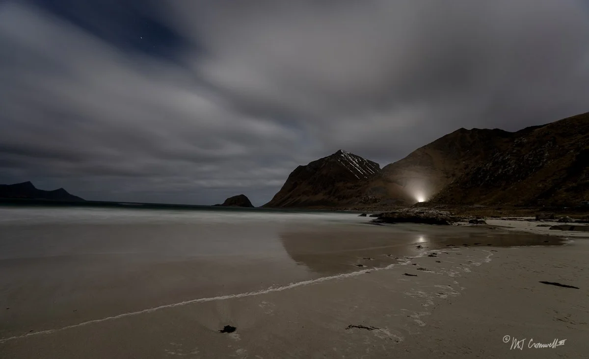 Car lights vs Northern Lights on Uttakleiv Beach
