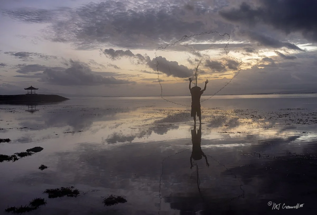 Bali Fisherman Throwing His Net