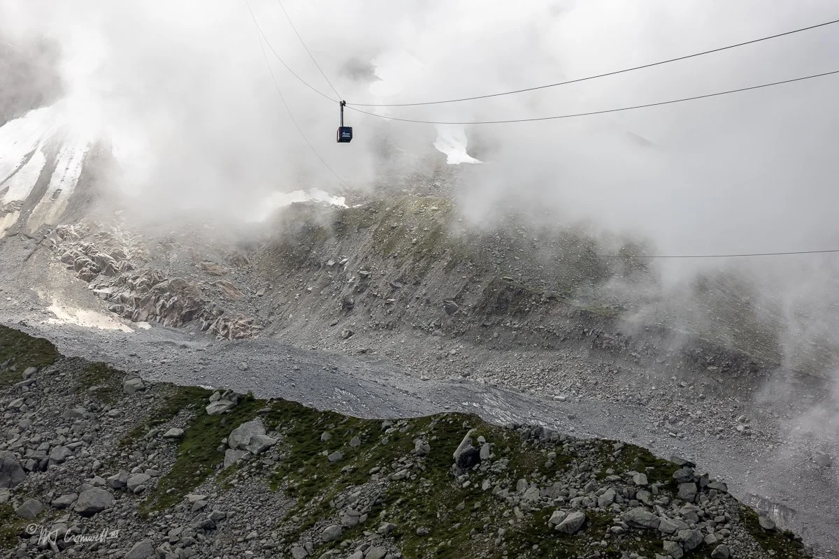 Cable Car heading to top of Aiguille du Midi in Chamonix