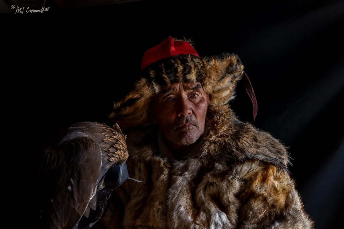 Portrait of First Eagle Hunter Host With His Golden Eagle