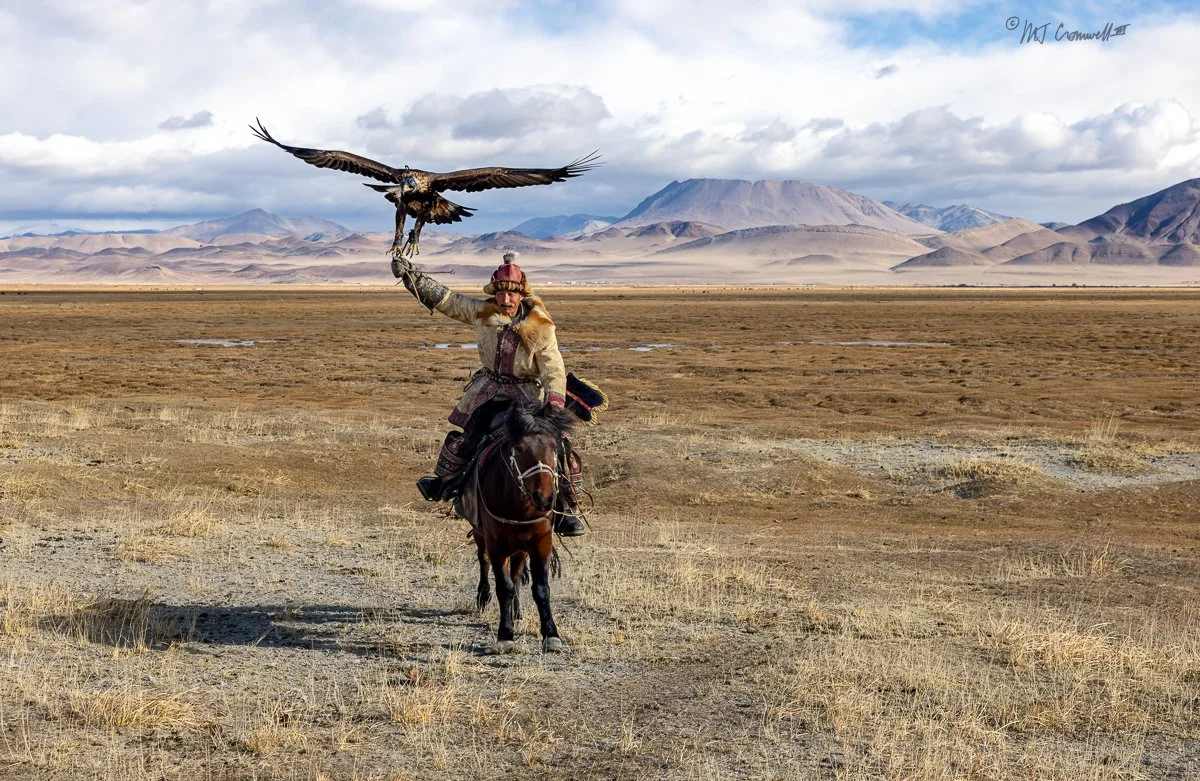 Son of Patriarch of Second Host Family Exercising Blindfolded Eagle