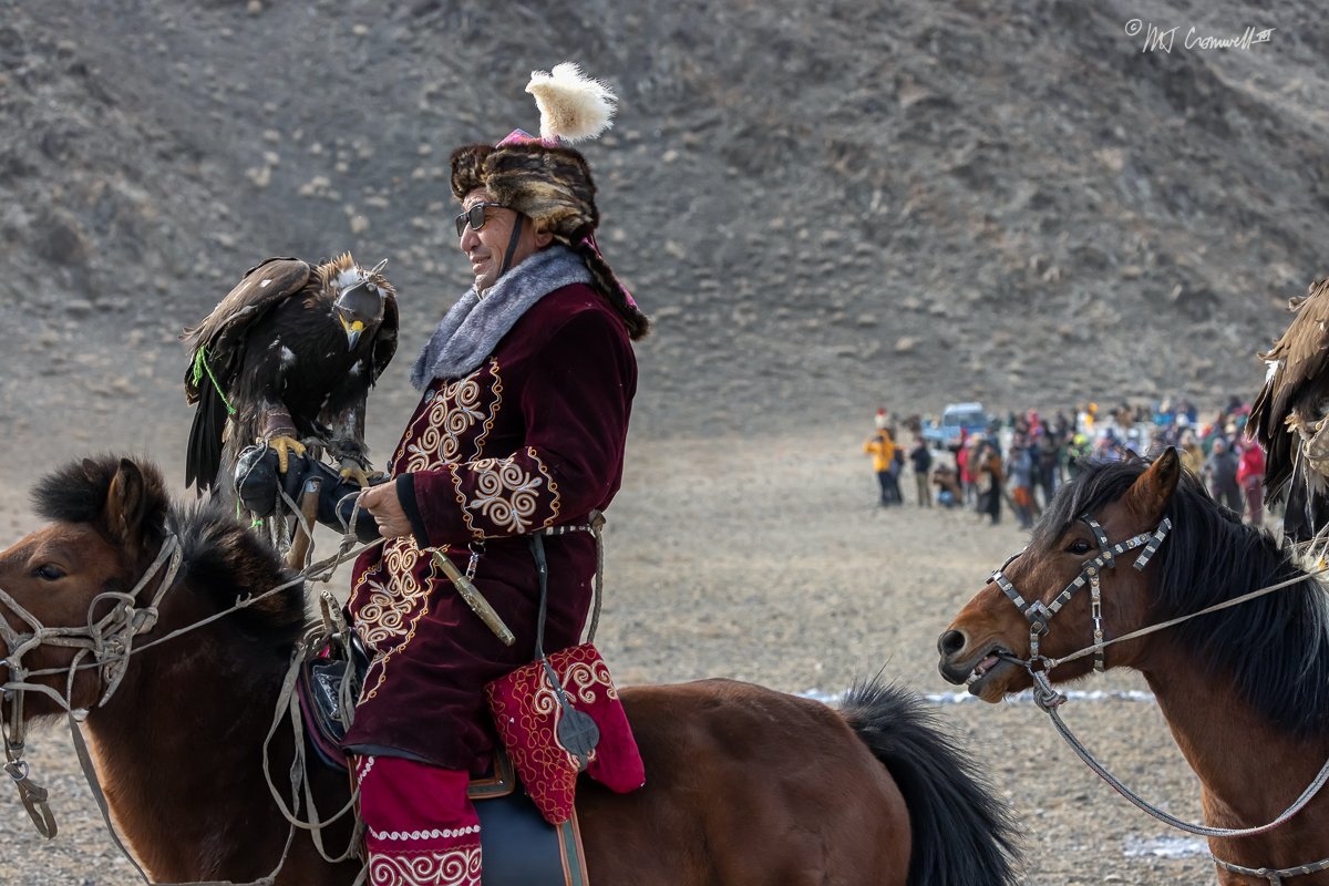 Competing Eagle Hunter in Parade With His Prada Sun Glasses