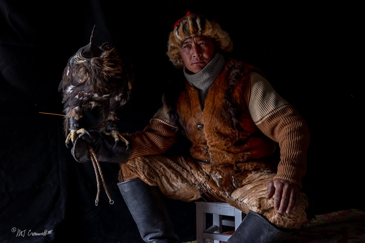 Portrait of Confident Eagle Hunter and His Eagle