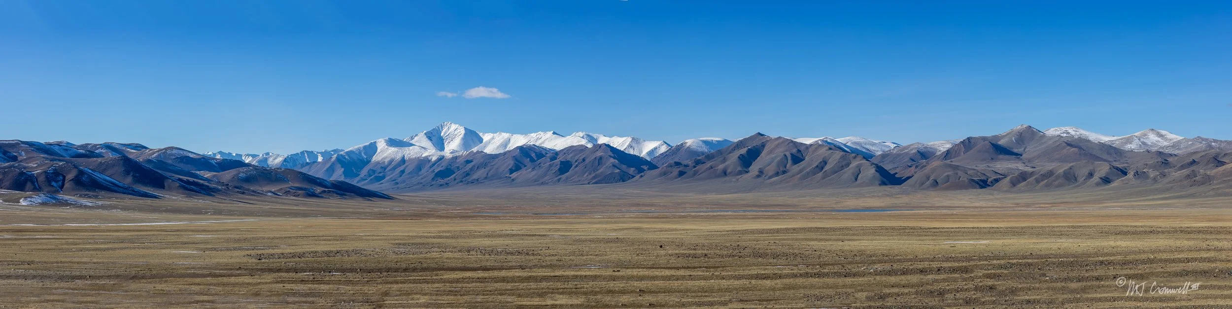Empty Steppe and Altai Mountains in the Distance With Russian Border Just Beyond