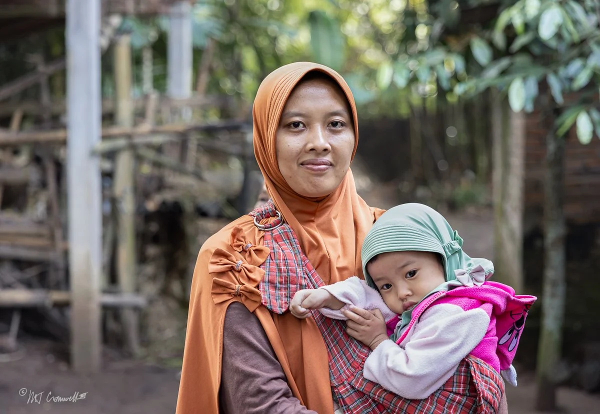 Mother and Child Near Borobudur Temple in Java