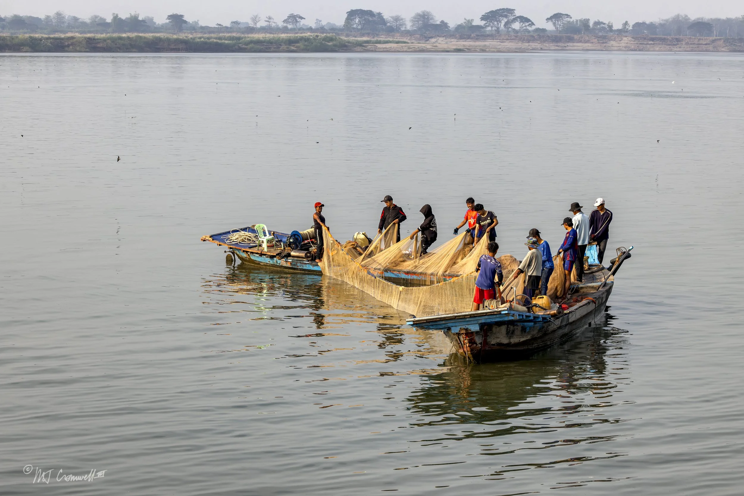 Fishing is a Team Effort on the Mekong River