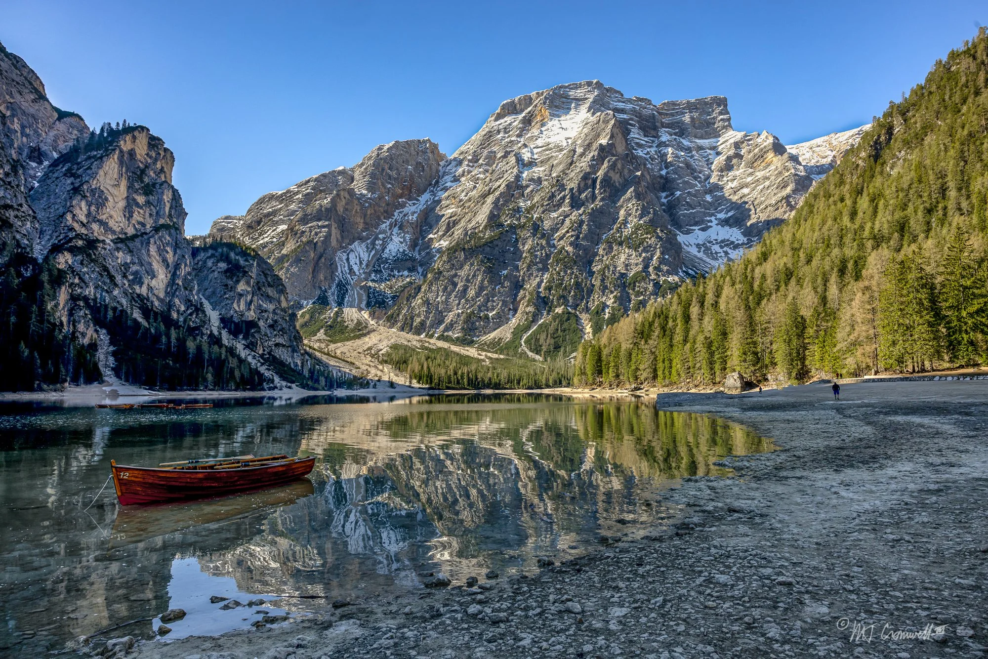 Reflections in Lago Di Braies in Dolomites