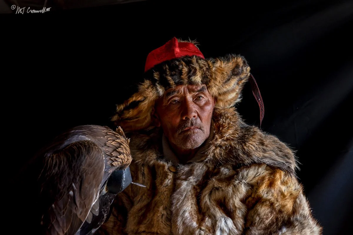 Portrait of First Eagle Hunter Host With His Golden Eagle