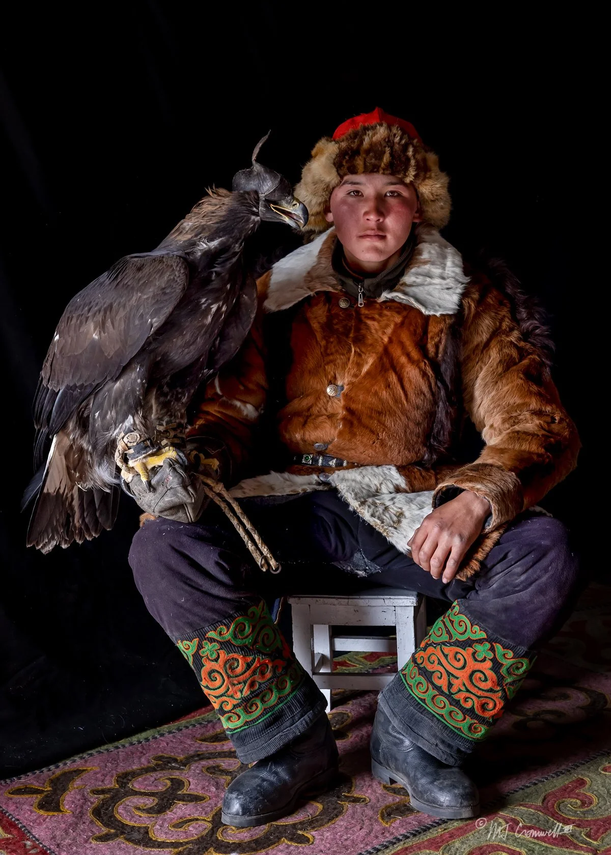 Portrait of Young Eagle Hunter and His Eagle