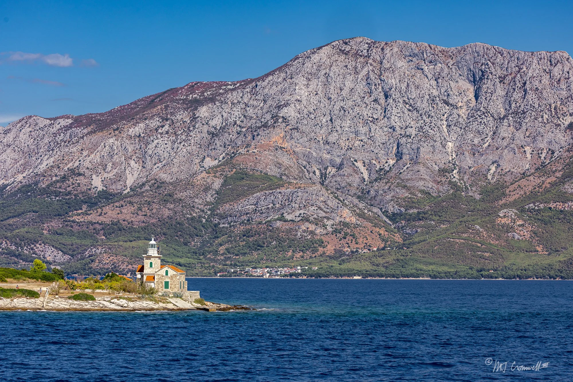 Sućuraj lighthouse on the tip of Island of Hvar with Sutvid ridge in the Background as we cruised to Korcula