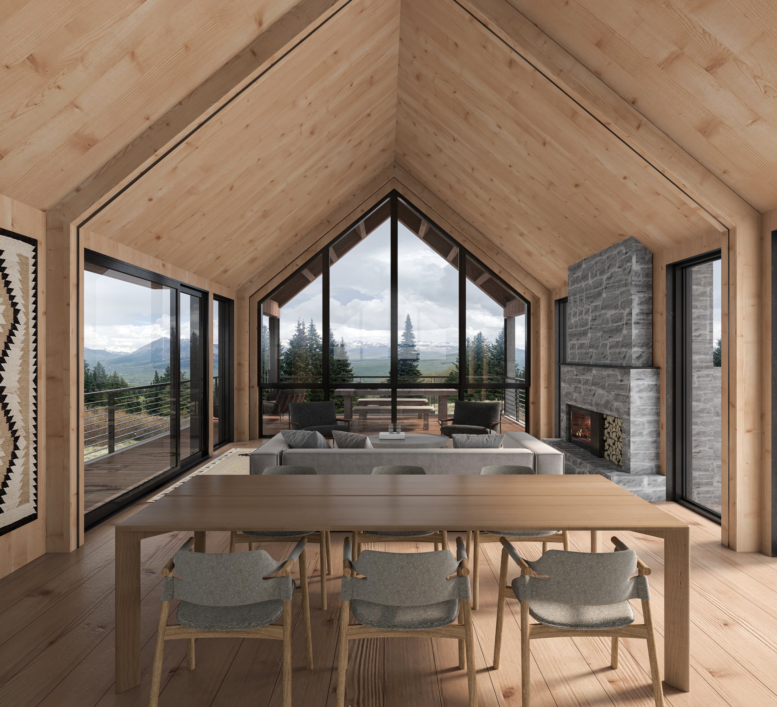 Modern living room with wooden walls and ceiling, large glass windows with mountain view, stone fireplace, dining table with six chairs, and a sitting area with sofas and armchairs.