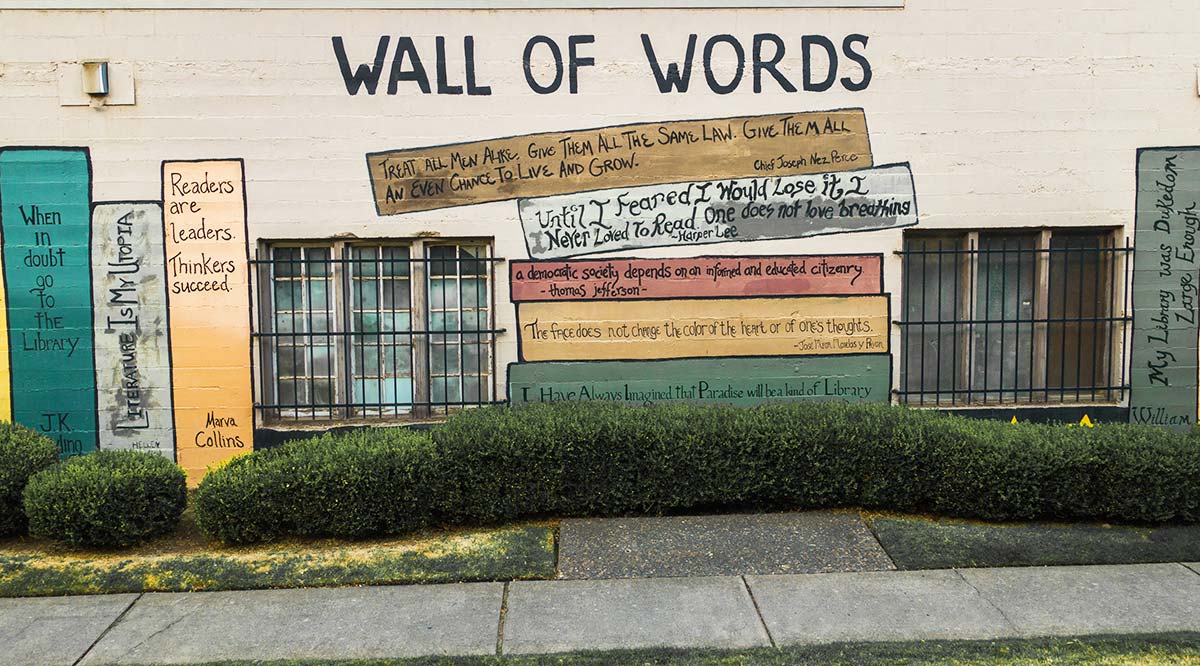 The Wall of Words mural near the Walla Walla Library parking lot