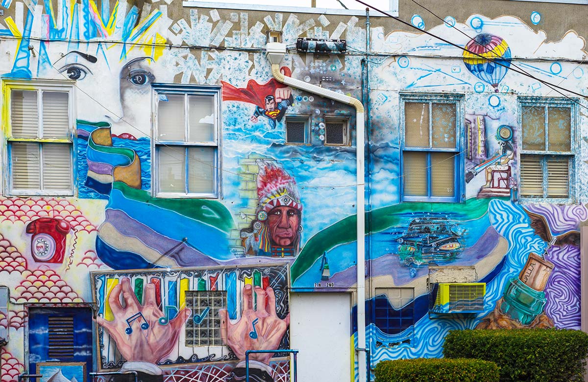 The mural behind the Quinn Building at the corner of 2nd Avenue and Rose Street