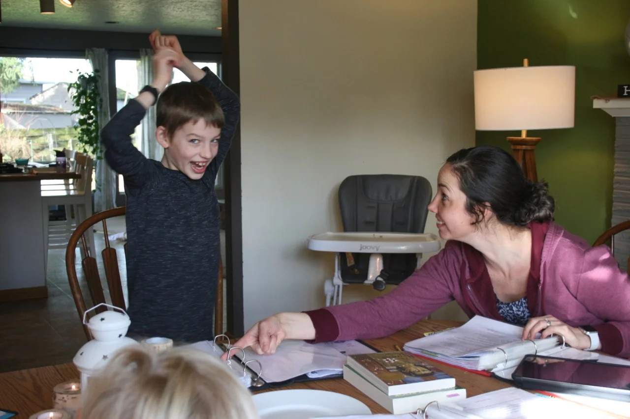 Real Life - Here Titus is dancing to our Scripture song, and I’m reminding him to follow along! Sometimes it gets a little out of control around here. :)