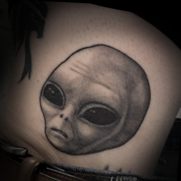 Healed Alien Head Tattoo