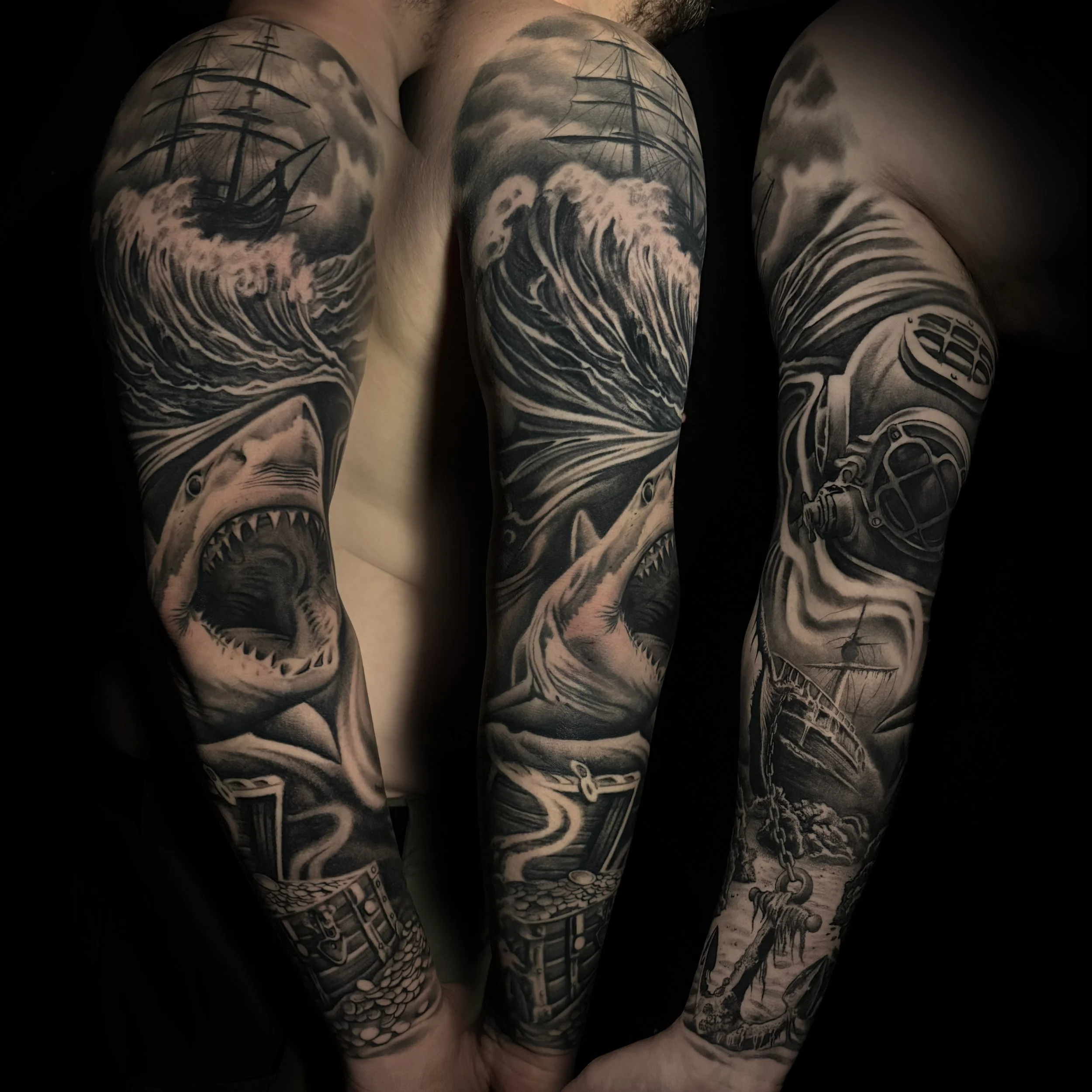 Underwater Nautical Themed Realistic Black and Grey Tattoo sleeve with a ship, shark, diver, sunken ship and treasure chest