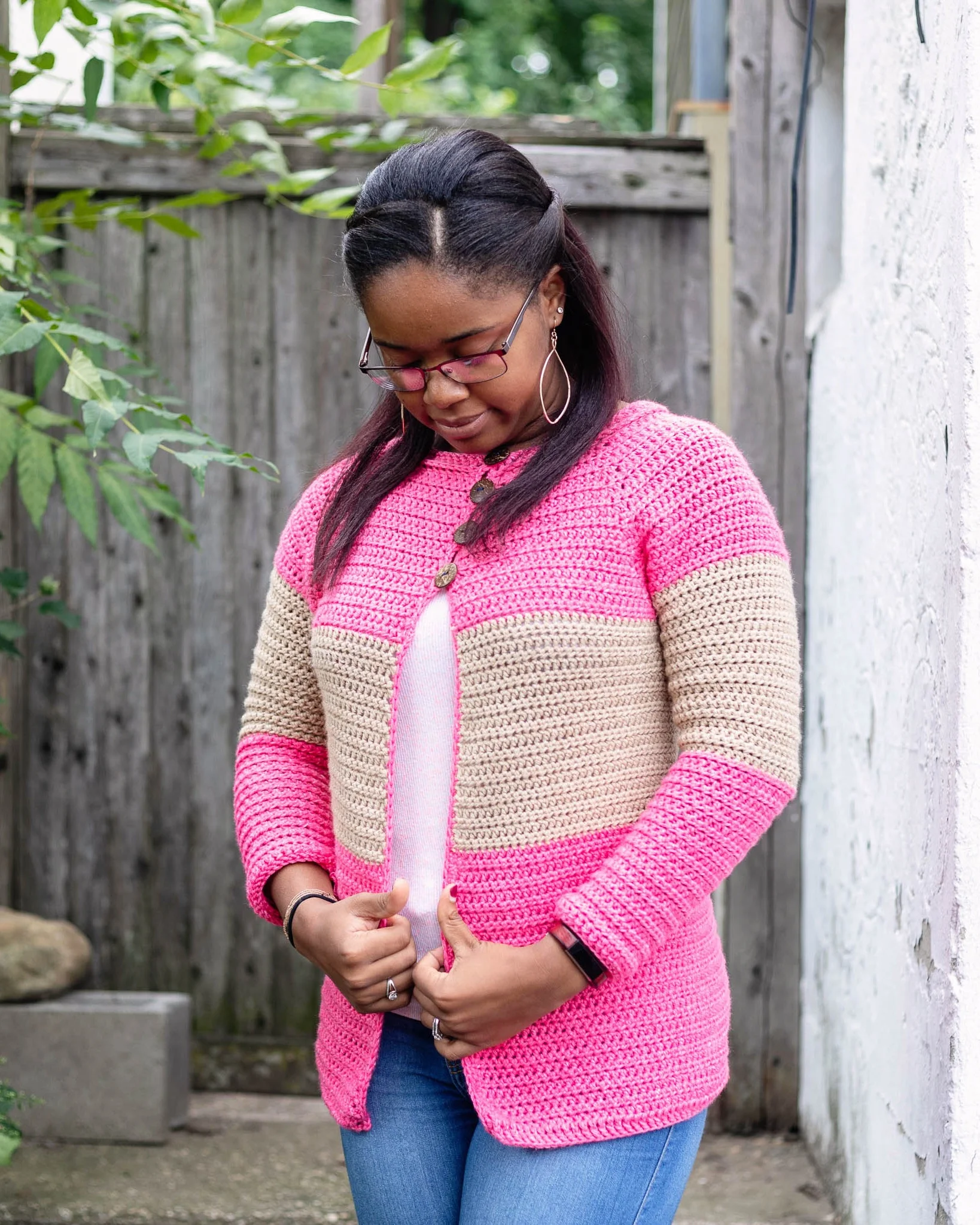 Random picture of me pretending to fix my brand new, handmade sweater.