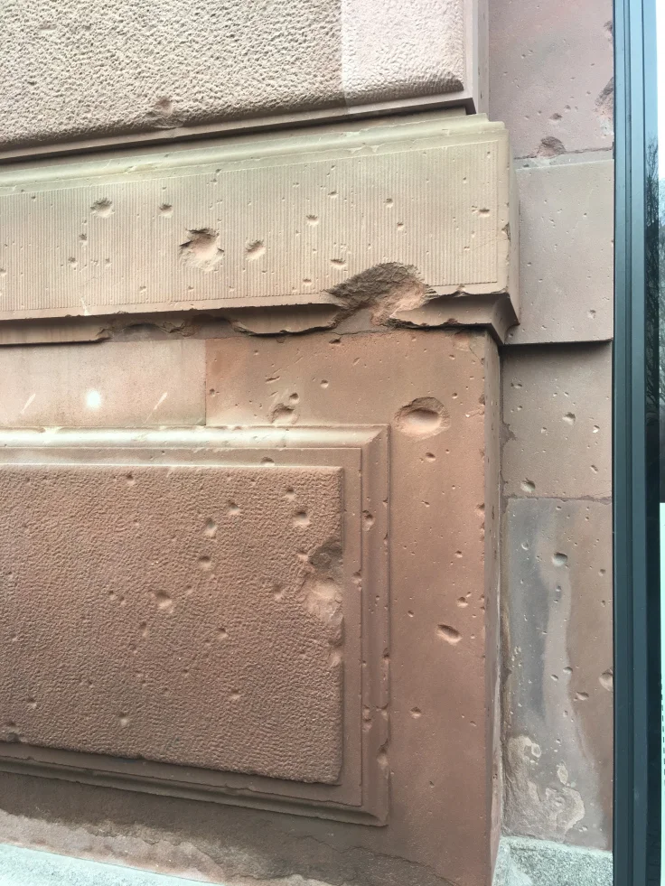 bullet-holes-in-east-berlin-building.jpg