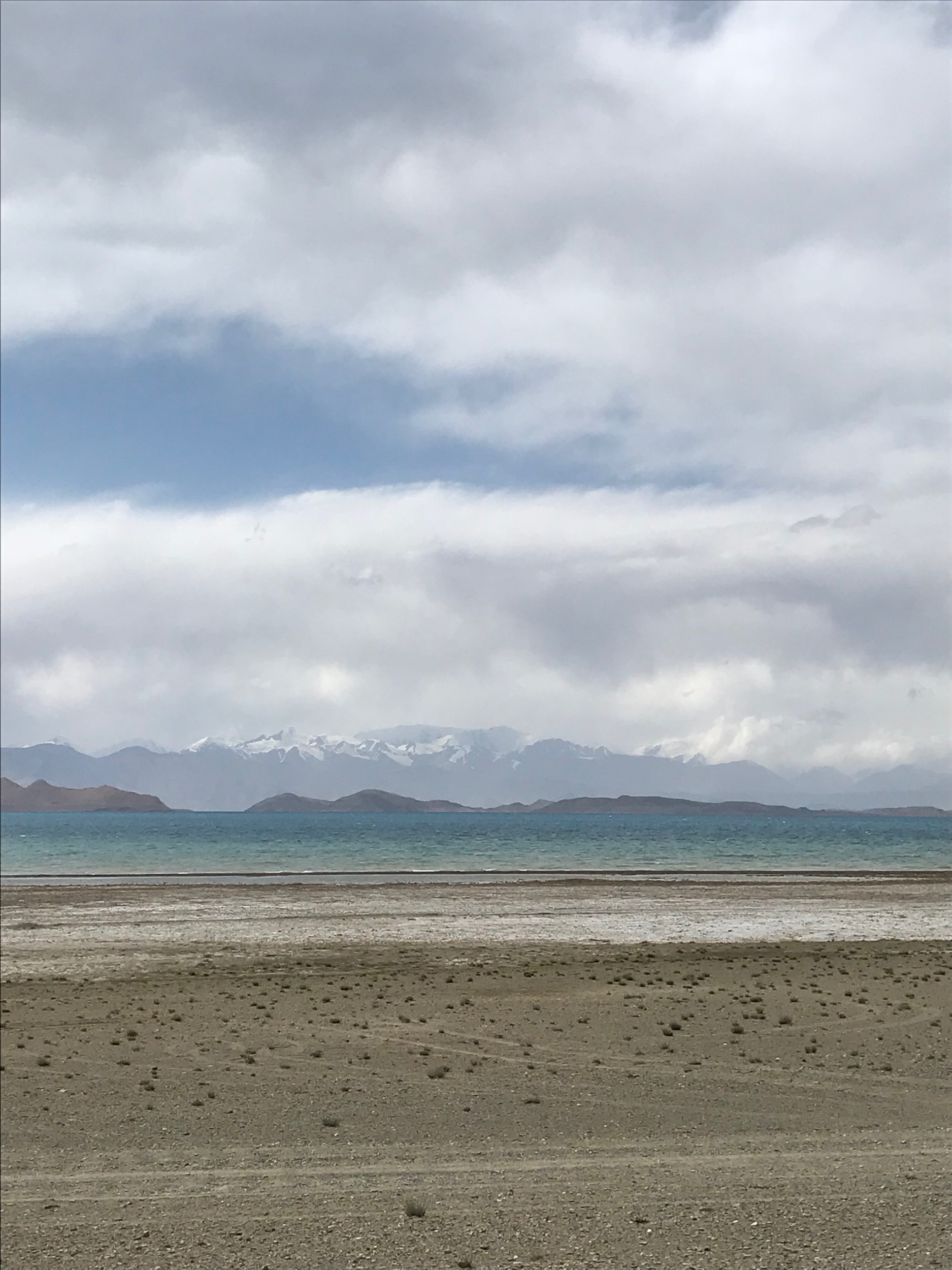 Lake Karakul with Lenin Peak in the distance