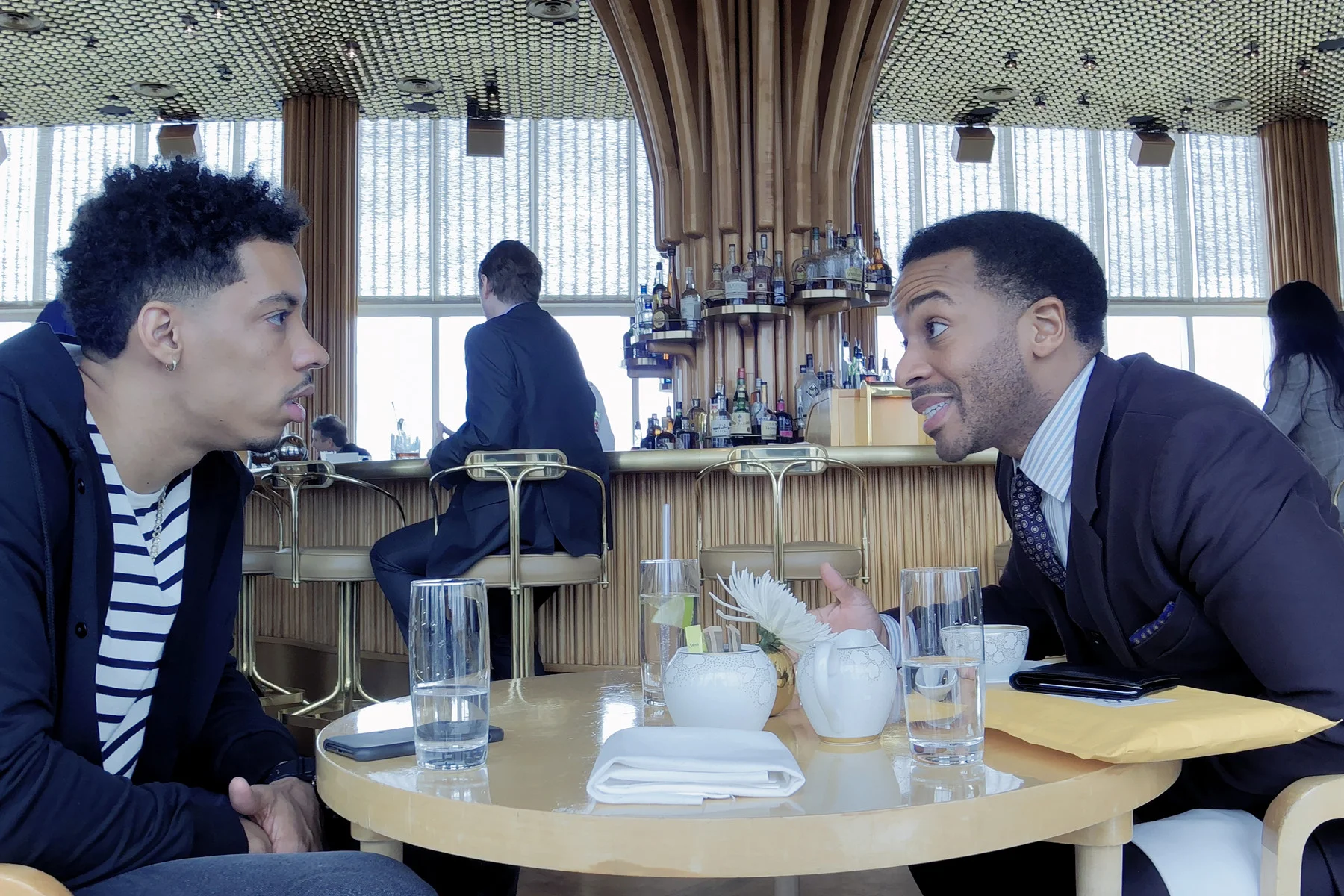 Andre Holland & Melvin Gregg in High Flying Bird , photo by Peter Andrews, courtesy of Netflix