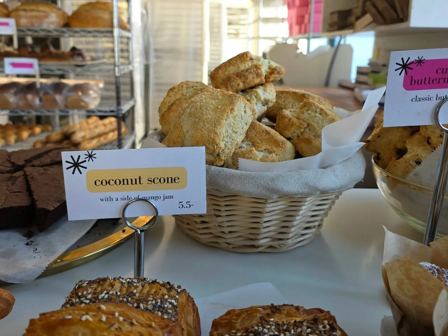 Our coconut scones have been a new hit on the weekends! Make sure to grab one on Saturday or Sunday with a side of mango jam 🥥🥭