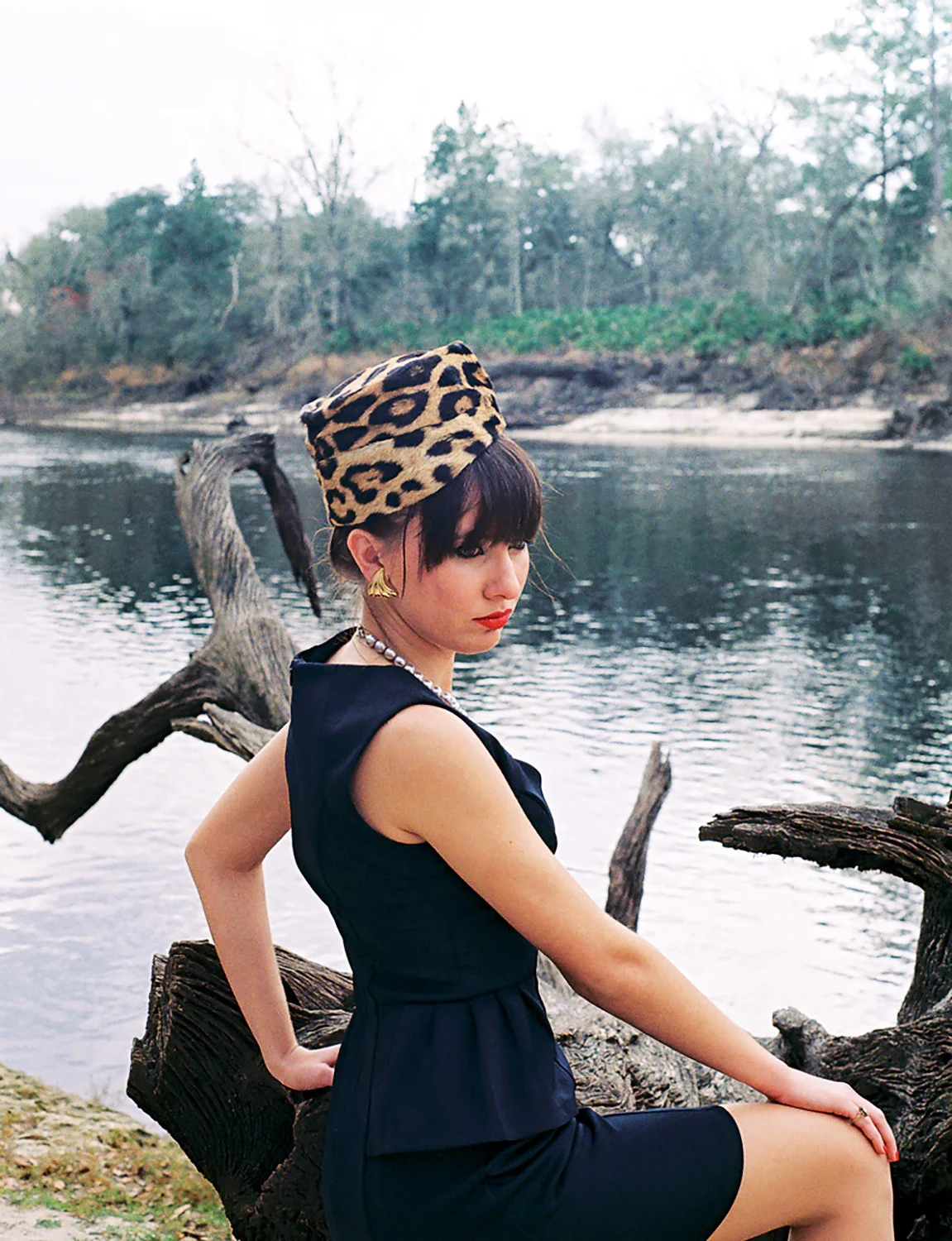 Copy of girlinblackdressleopardhat.jpg