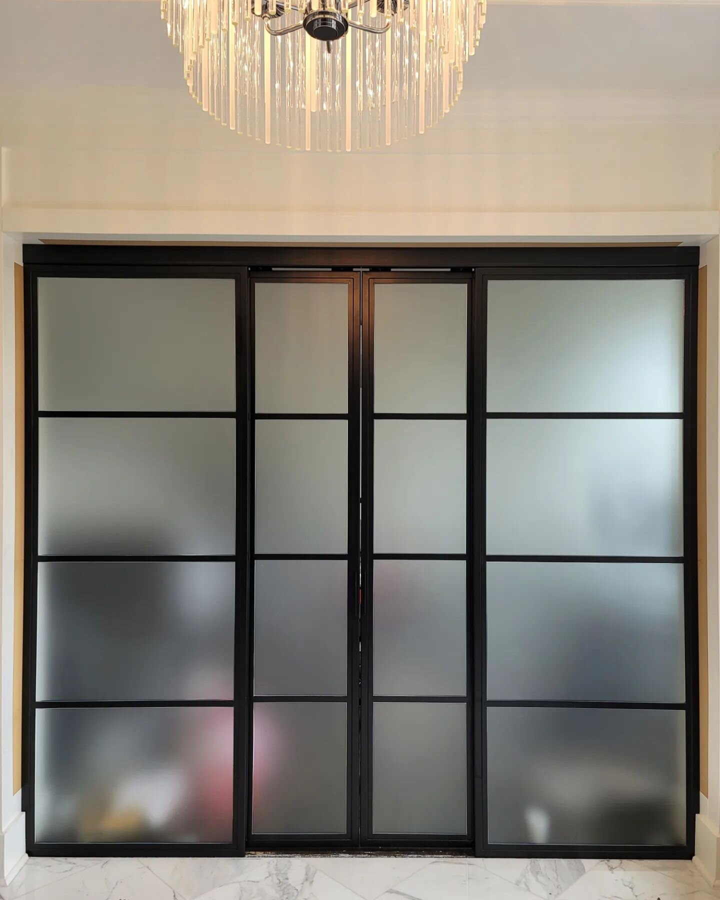 Sliding french doors we fabricated/installed  completed with the privacy by others. #
