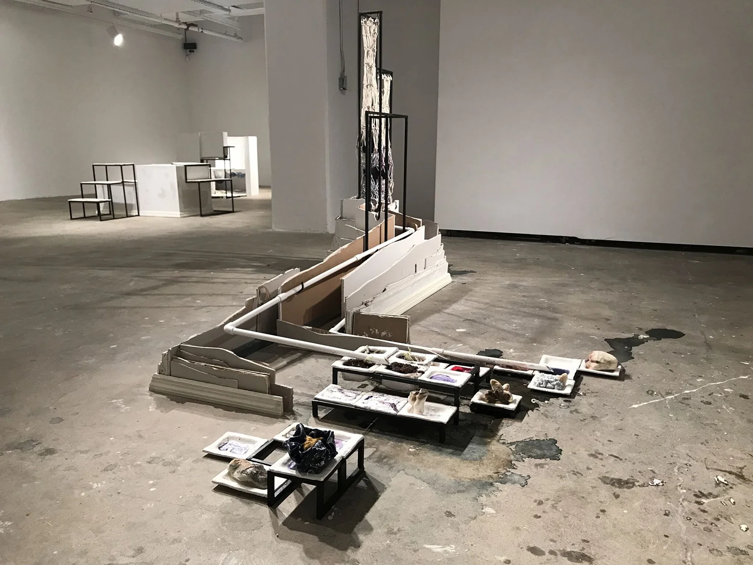 2017 drywall, wood, metal, ceramic, PVC pipe, rope, rubber, coconut oil with healing herbs, cabbage and cabbage juice 61” x 98” x 63”