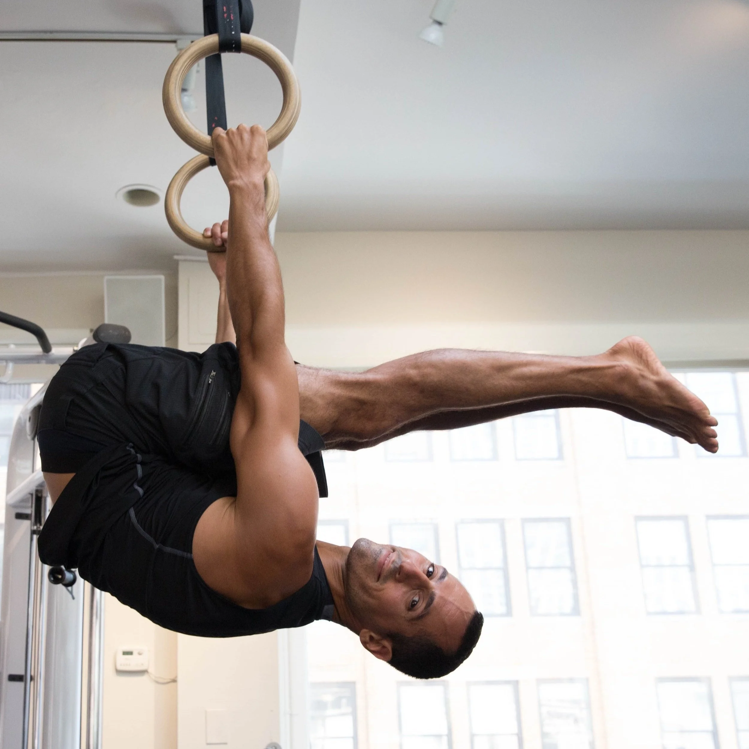 Jonathan Angelilli at a gym in Nomad NYC doing strength training