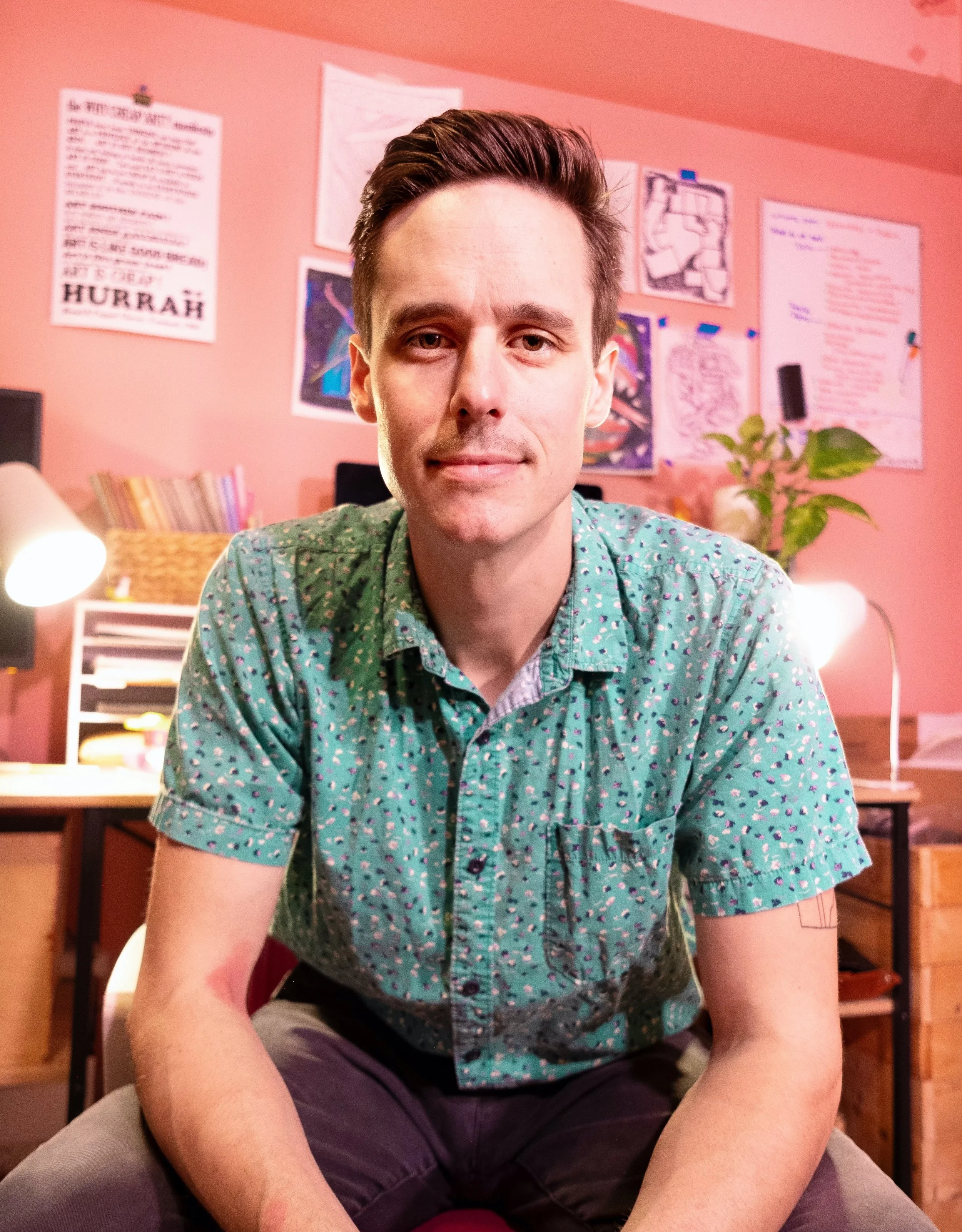 Portrait of illustrator Andrew Haener in his studio