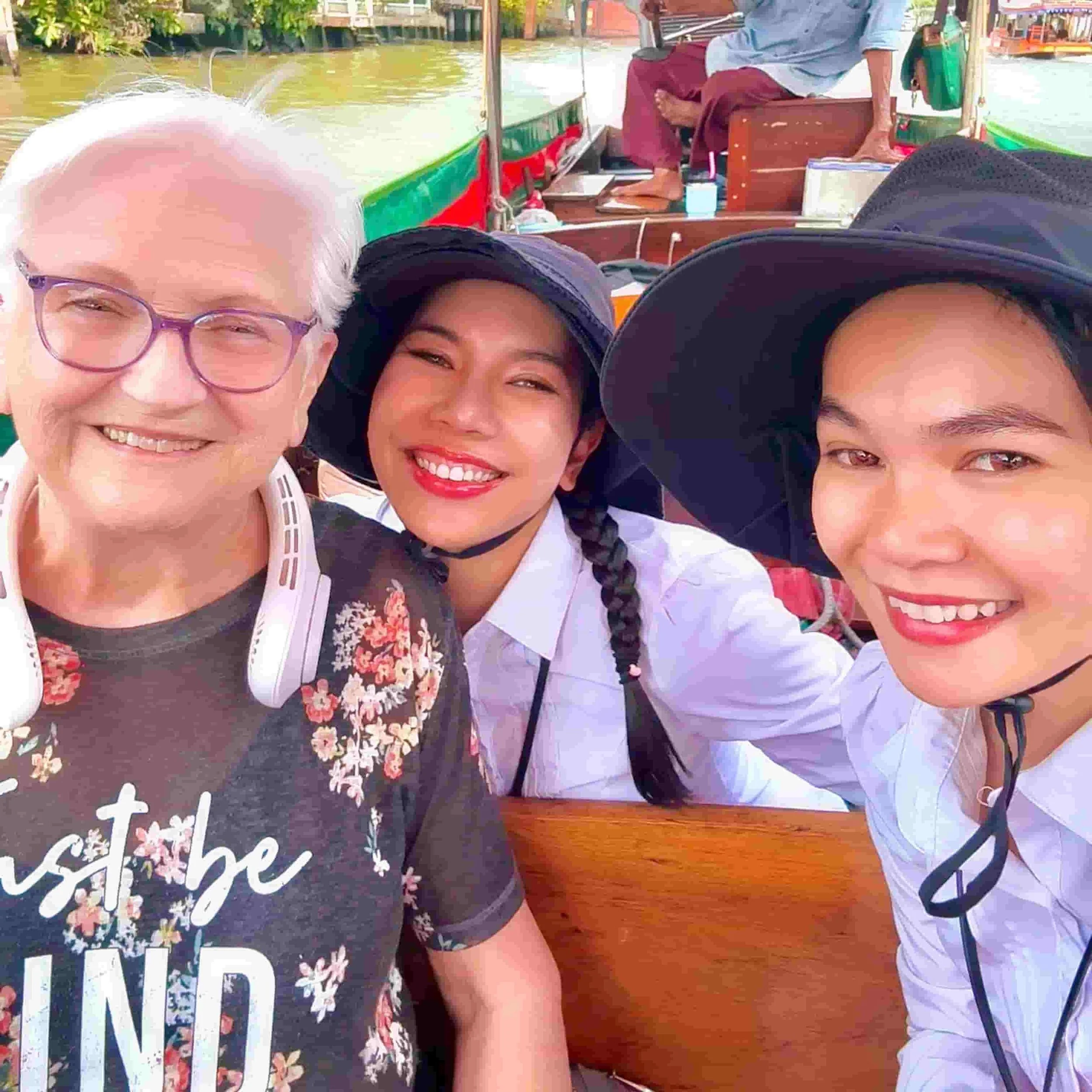 Mandy and Emma on canal boat ride in Bangkok with grandmother private tour