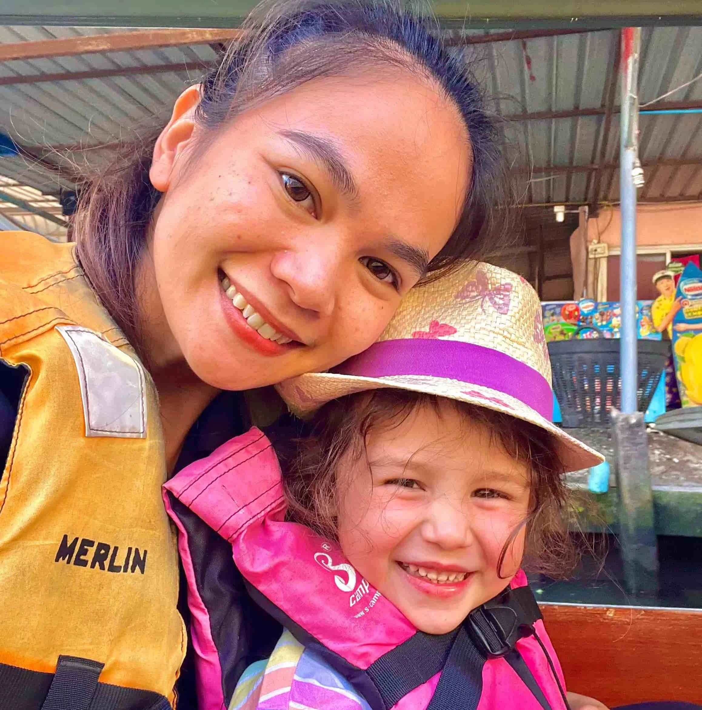 Family with Child having fun on the boat with female private tour guide Emma