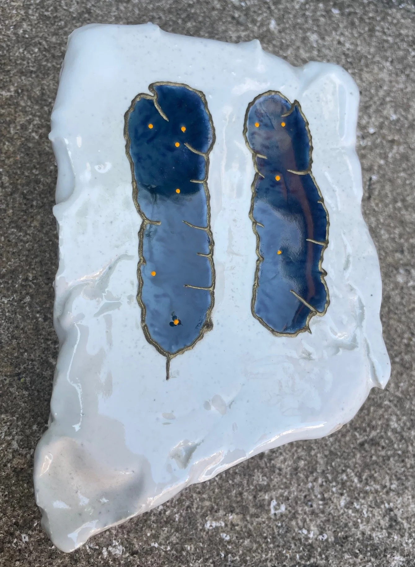 J.+Ivcevich_Brickface(Sky)_5x4x2_2025_glazed+ceramic+polymer+relief_$300_unique (1).jpg