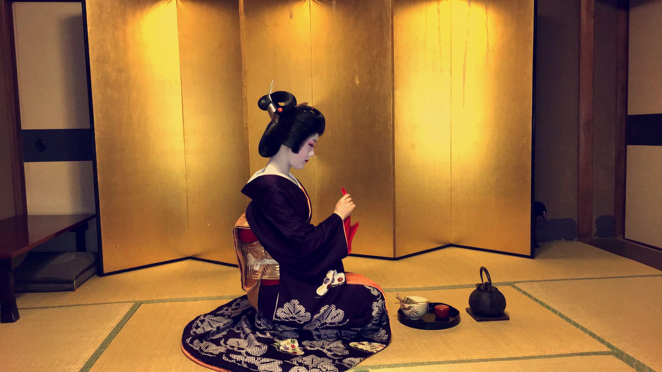 A traditional tea ceremony with a geisha in Kyoto, Japan, 2017.