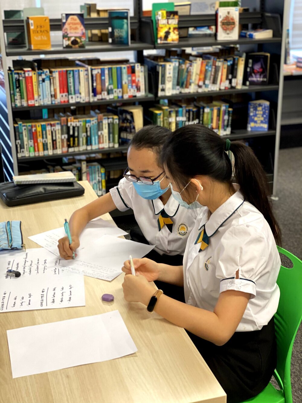  Two students at Australia  International School during 1 of 6 creative writing classes co-led by  Lois Orekoya (Black in Asia writer) and myself 