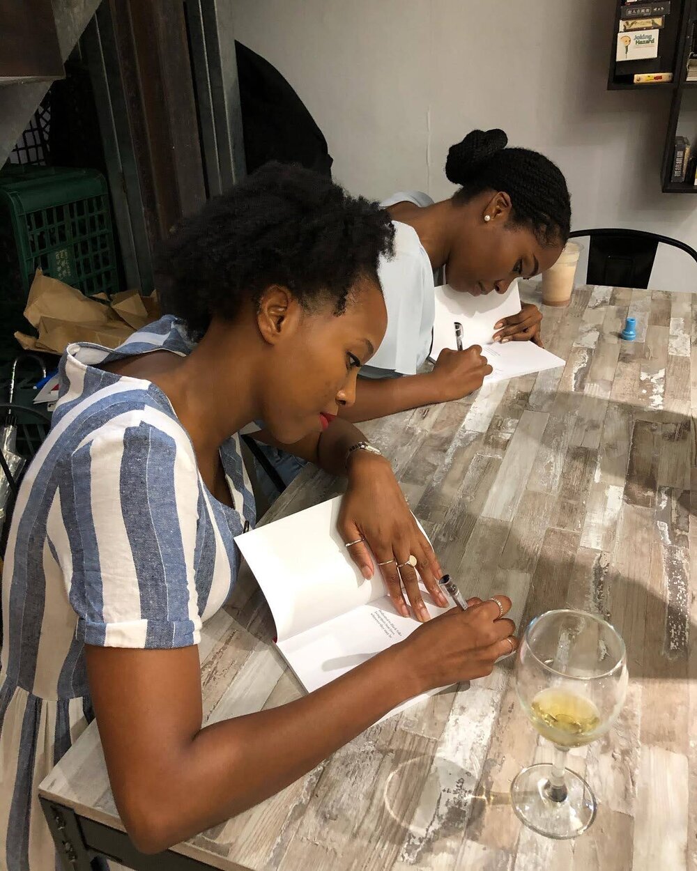  Bernise Springer and Whitney Cele autographing books in Taipei during our  Black in Asia  launch event in Sep 2020 