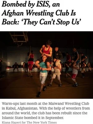 International support comes together to rebuild wrestling gym.