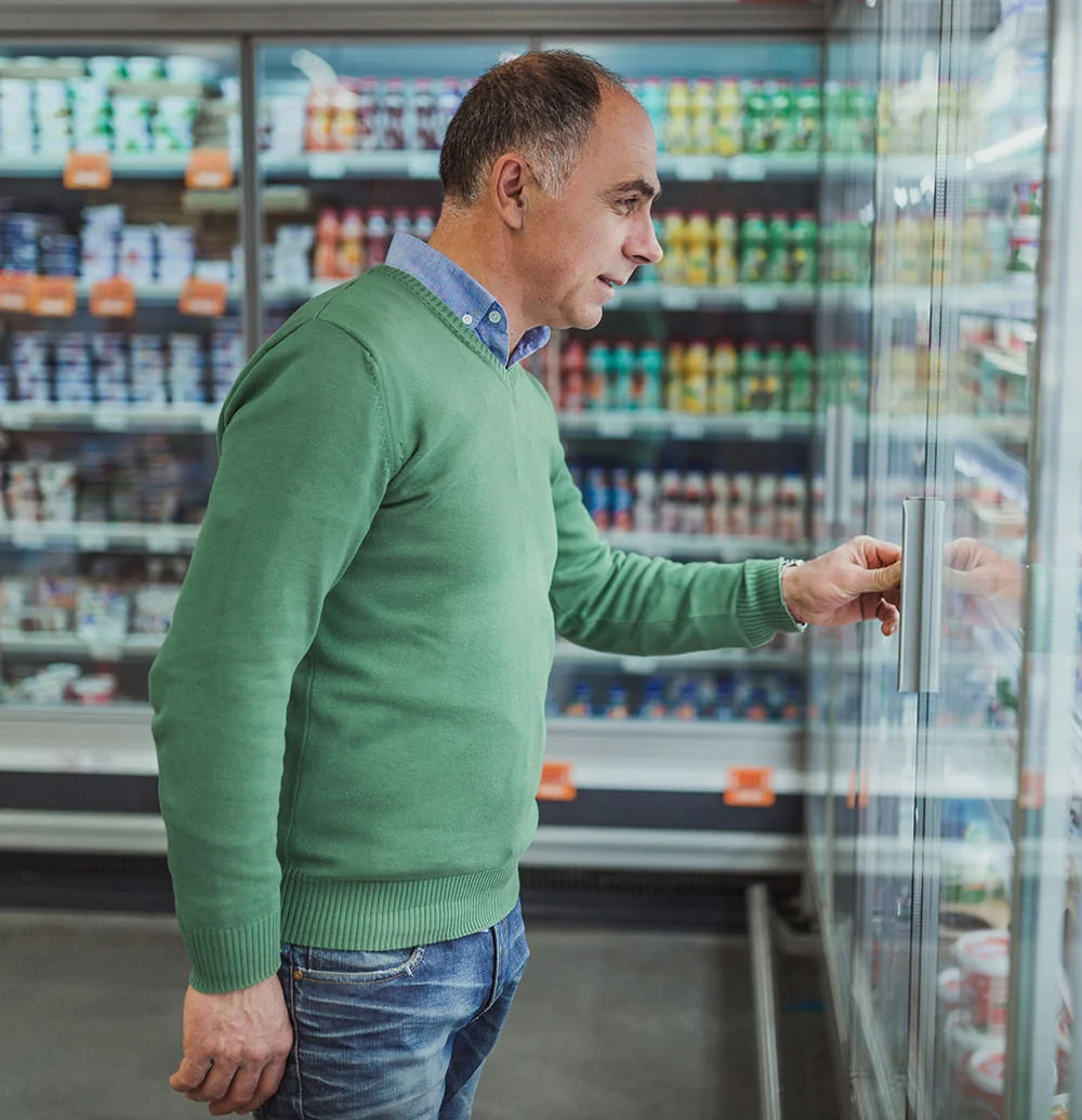 Grocery-customer-man-refrigerator-case.jpg