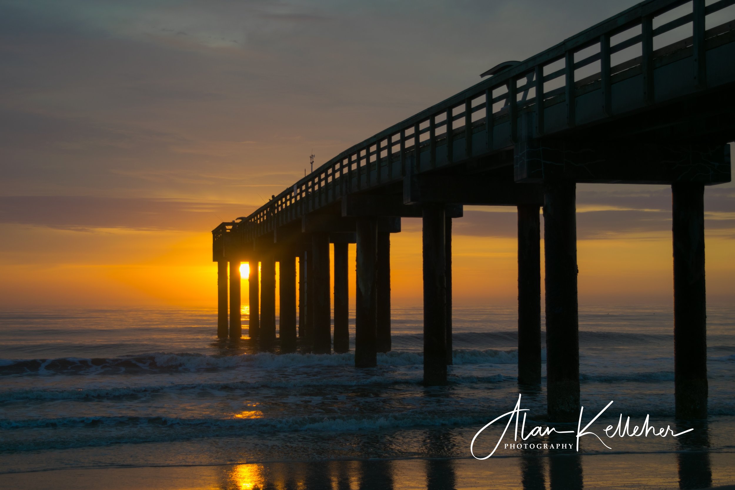Sunrise under pier.jpg